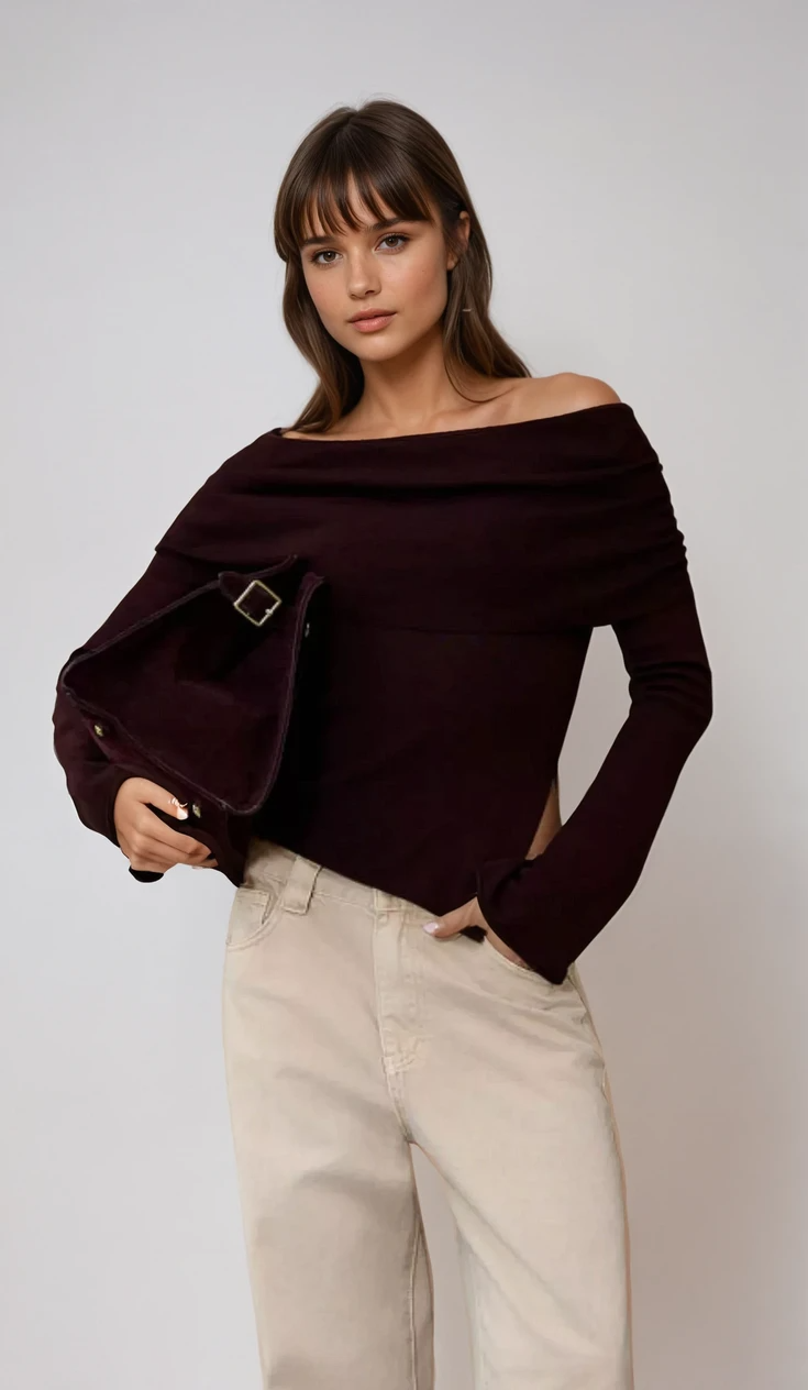 TOP MANGA LARGA CON HOMBRO DESCUBIERTO Y DOBLADILLO ASIMÉTRICO